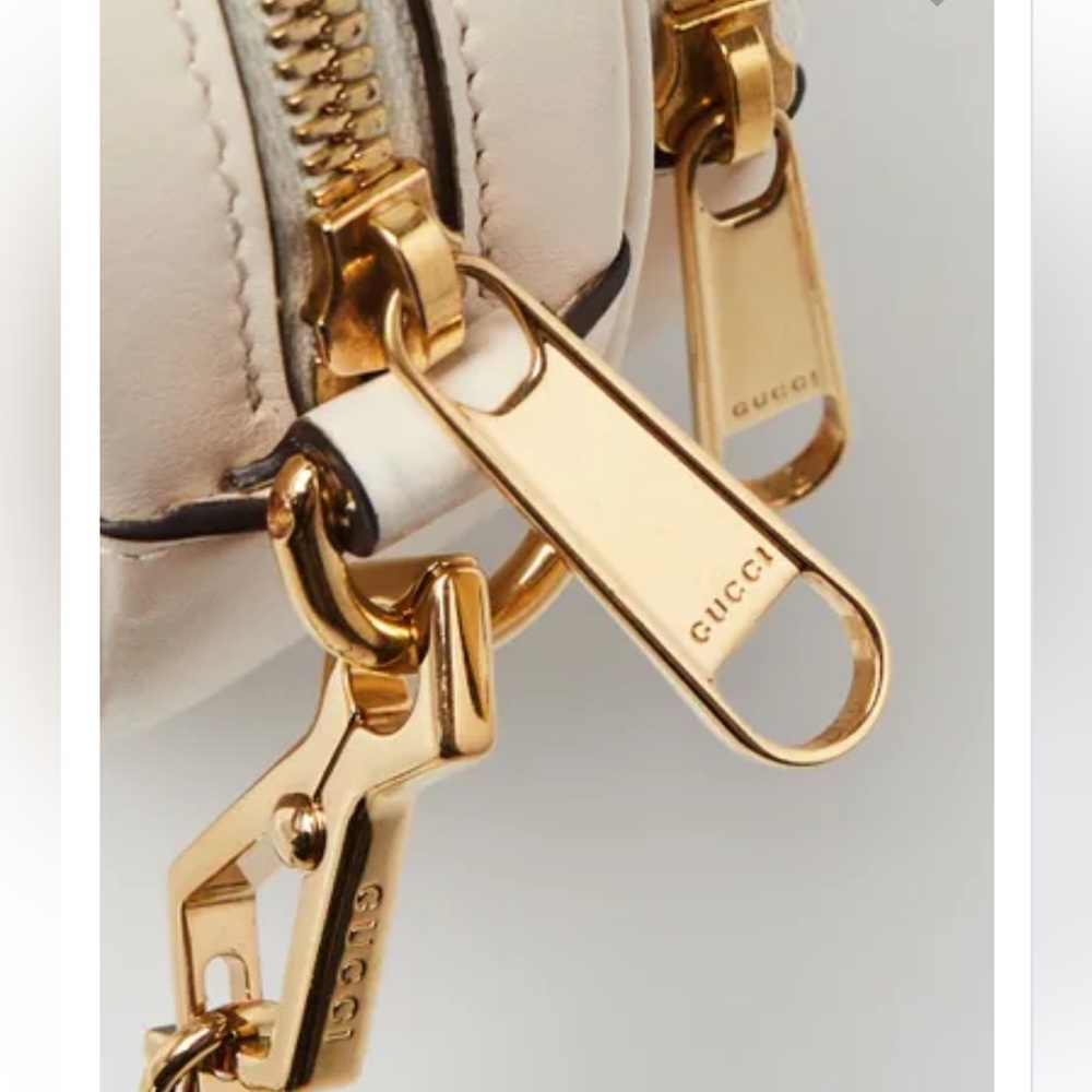 New! GUCCI
White Quilted Leather
Interlocking G Mini Heart
Crossbody Bag - Picture 12 of 12